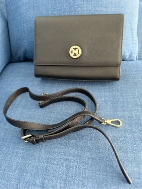 METROCITY Black Leather Crossbody Bag with Gold Emblem